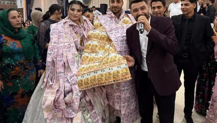 Düğünde gelin ve damada paradan yelek giydirip, taç taktılar